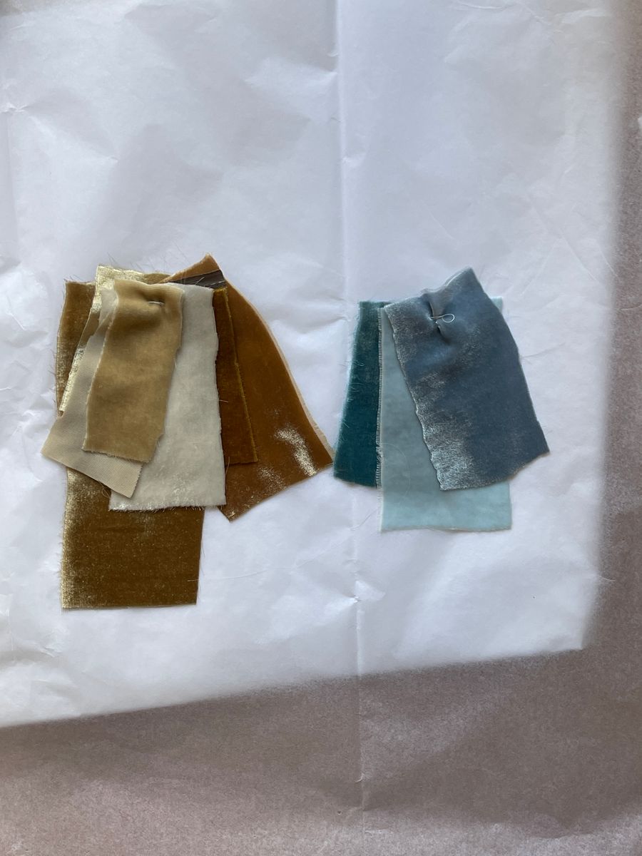 Velvet fabric swatches in gold and teal